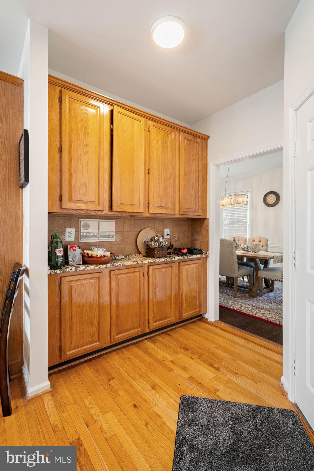 7616 Seabrook Lane Springfield, VA 22153 - Photo 15 of 37 Warm wood tones in a cozy kitchen.