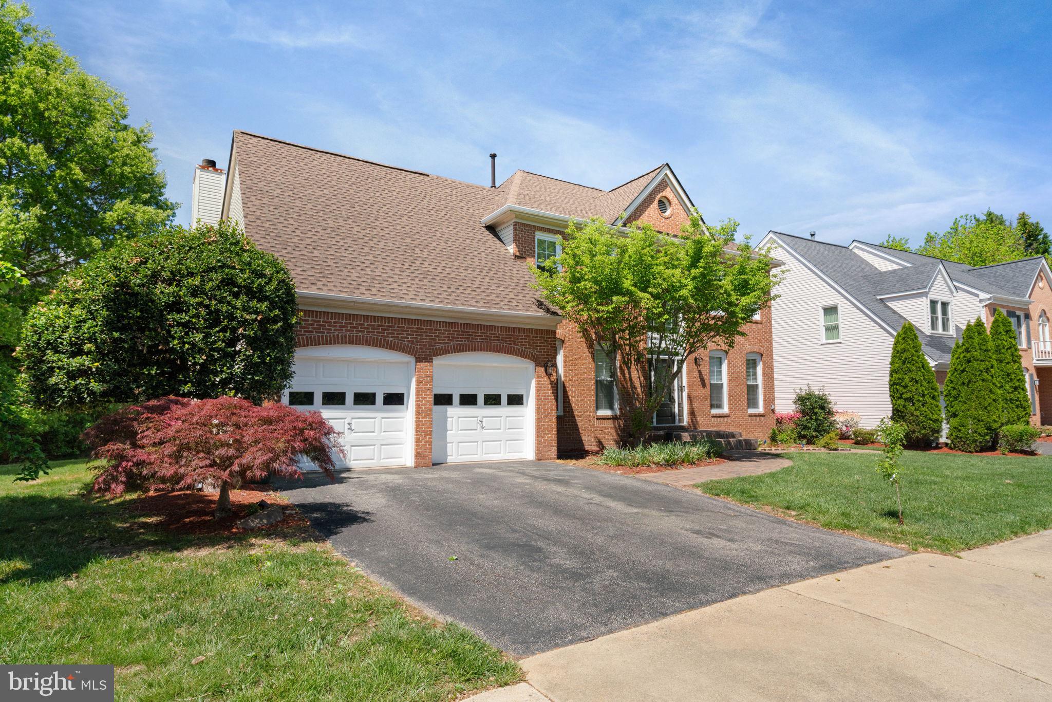 7616 Seabrook Lane Springfield, VA 22153 - Photo 3 of 37 Charming home with lush greenery.