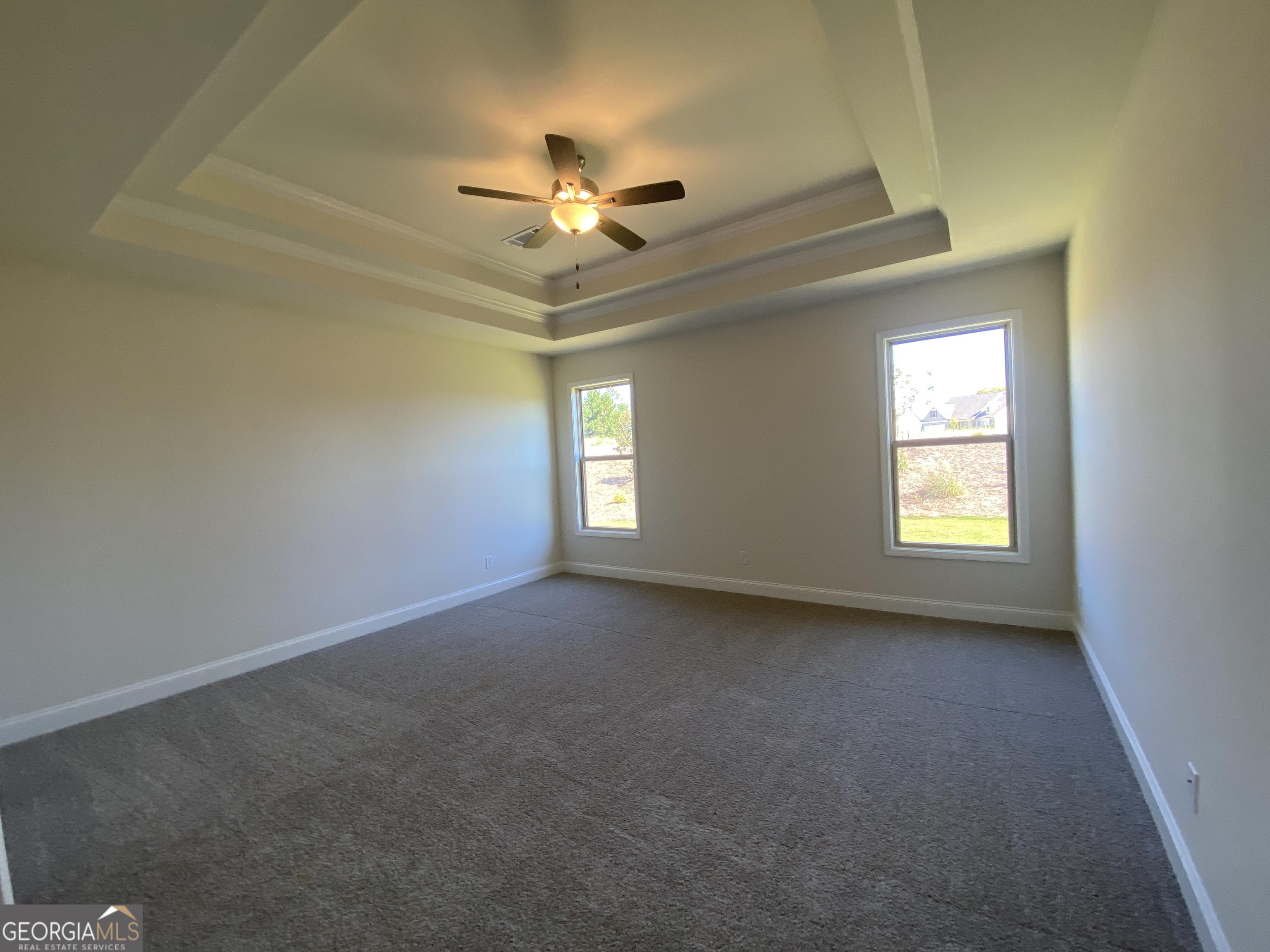 174 Oakdale Road, Unit 34 Jefferson, GA 30549 - Photo 32 of 64 Double trey ceiling with crown molding and a ceiling fan