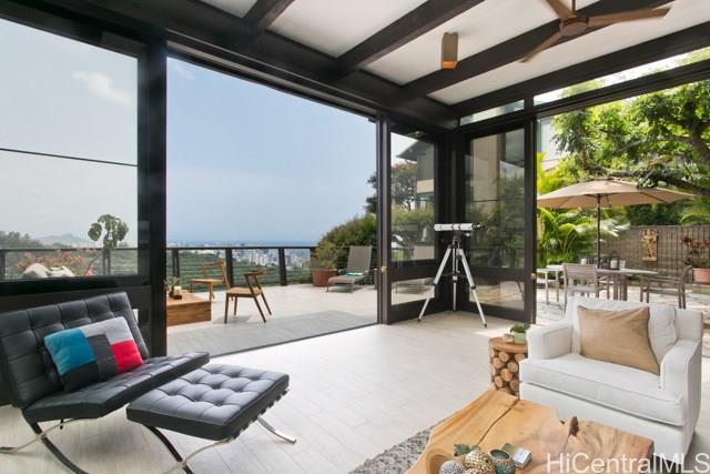 3077 Wailani Road, Unit 3 Honolulu, HI 96813 - Photo 1 of 1 a living room with patio furniture and a potted plant