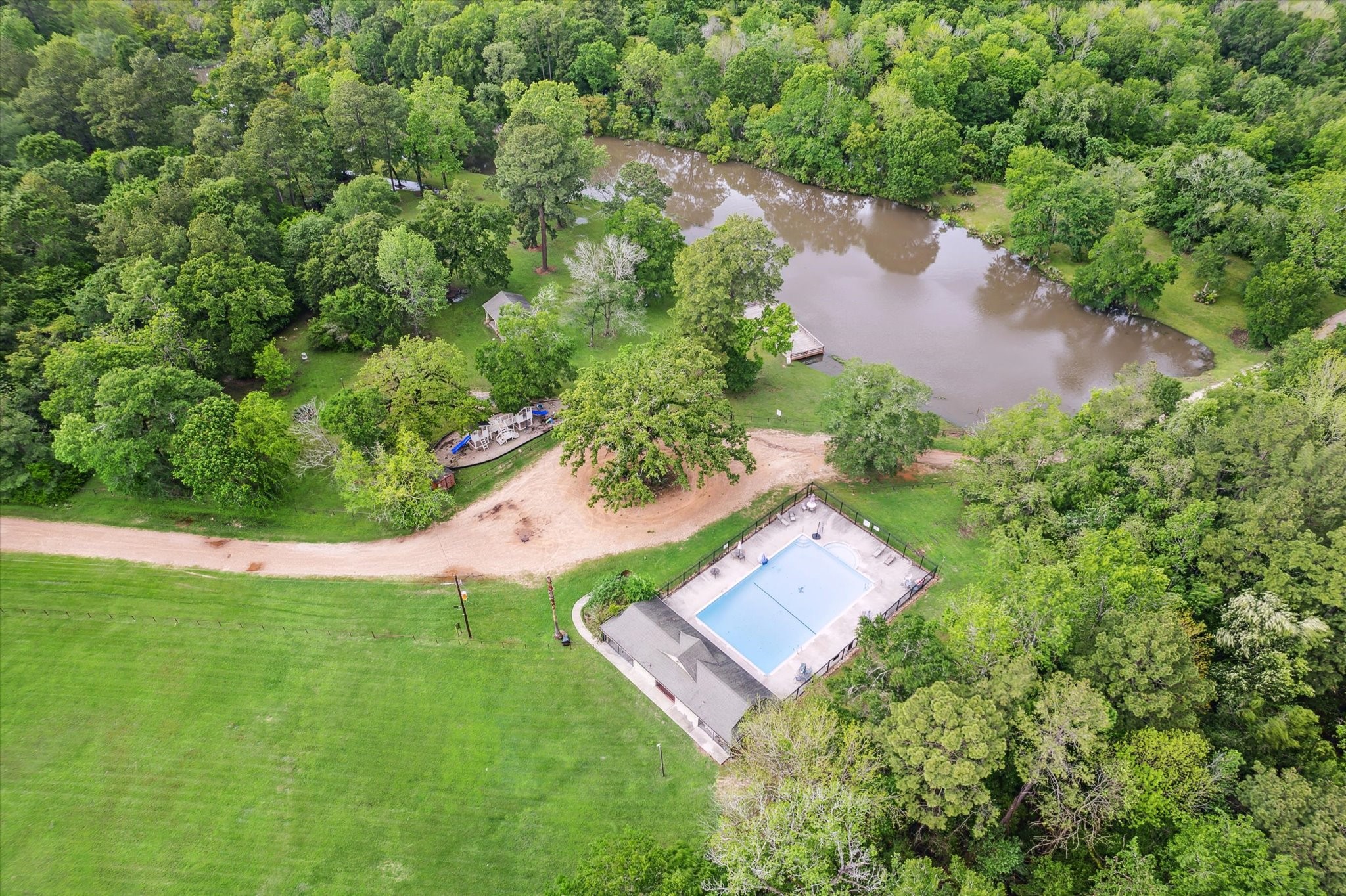2420 Canter Lane Conroe, TX 77384 - Photo 23 of 24 an aerial view of a house with a yard