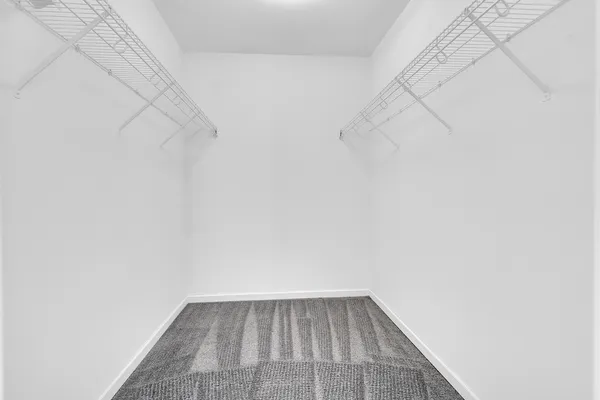 a view of a room with white wall