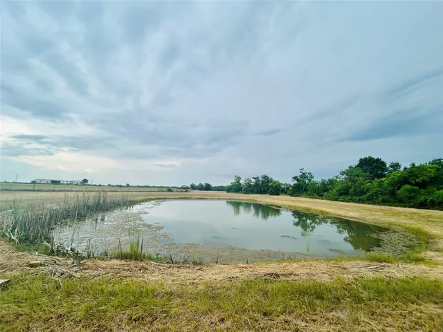 a view of a lake with outdoor space