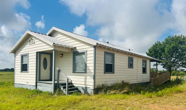 a view of a house with a balcony