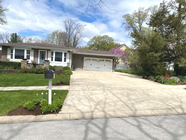 314 Ruth Avenue St. Charles, IL 60174 - Photo 2 of 36 a front view of a house with a yard
