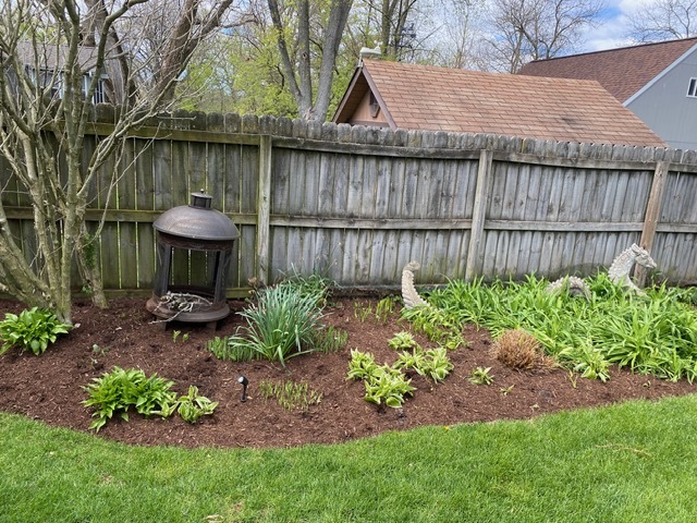 314 Ruth Avenue St. Charles, IL 60174 - Photo 32 of 36 a view of a backyard with a table and a chairs
