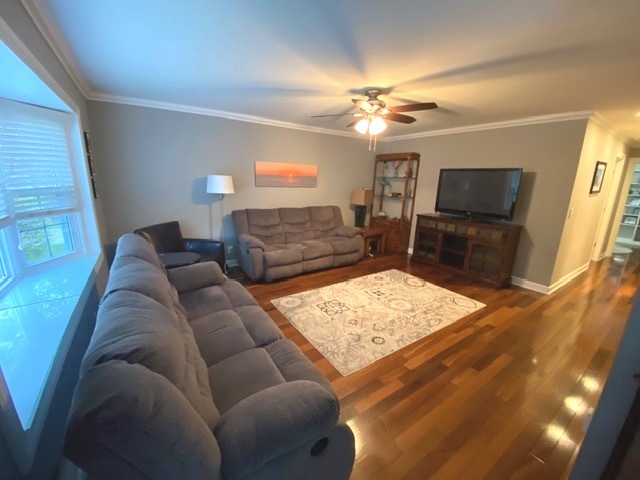 314 Ruth Avenue St. Charles, IL 60174 - Photo 6 of 36 a living room with furniture and a flat screen tv