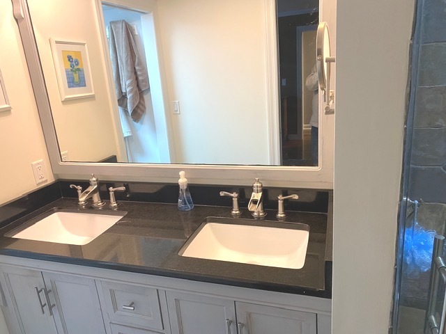 314 Ruth Avenue St. Charles, IL 60174 - Photo 9 of 36 a bathroom with a sink and a mirror