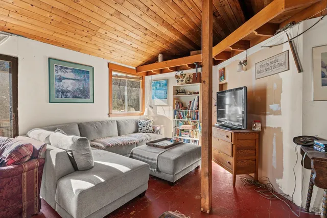 a view of balcony with furniture and wooden floor