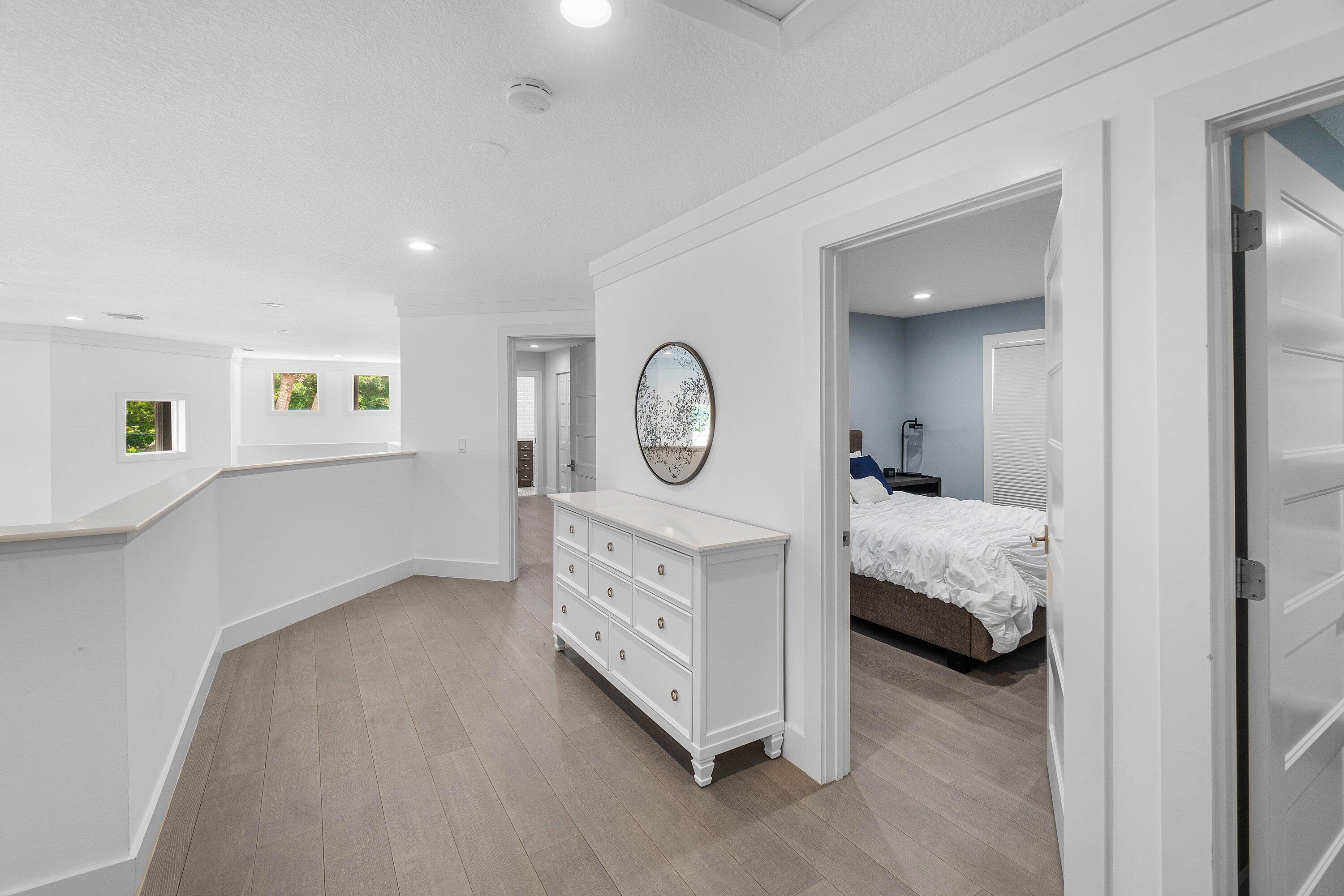 2404 Northwest 67th Street Boca Raton, FL 33496 - Photo 29 of 74 a bedroom with a bed and a closet