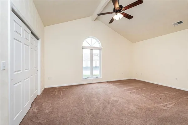 an empty room with windows