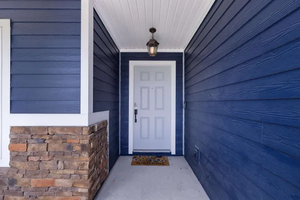 a front view of a house with a shower