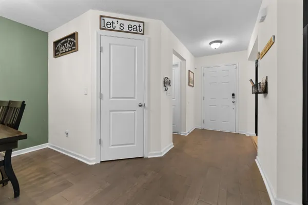 a view of a hallway with closet area