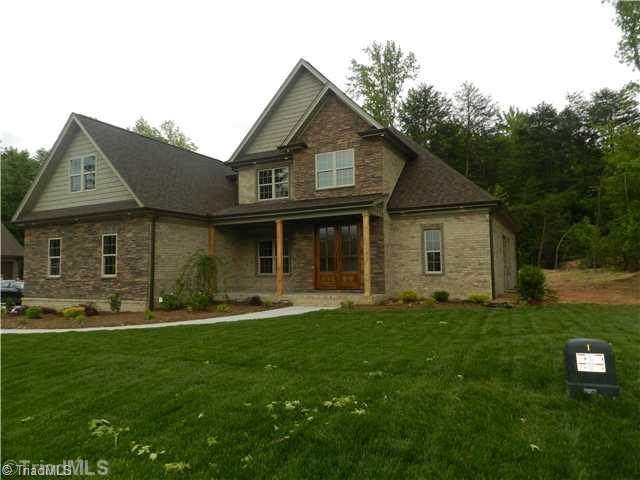 8901 West Pepper Court Oak Ridge, NC 27310 - Photo 2 of 11 Exterior Front.