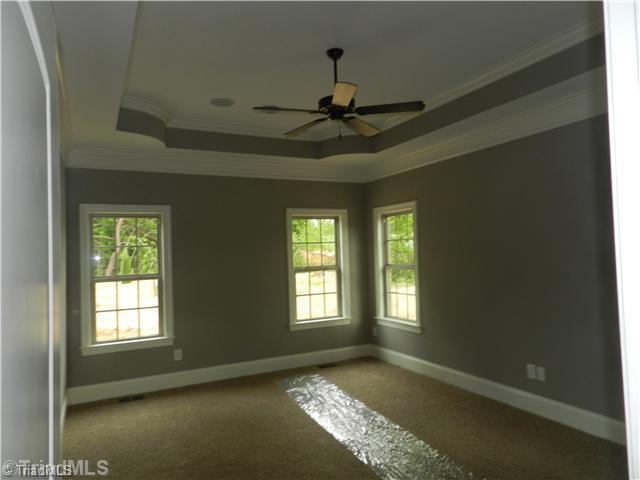 8901 West Pepper Court Oak Ridge, NC 27310 - Photo 8 of 11 Master Bedroom.