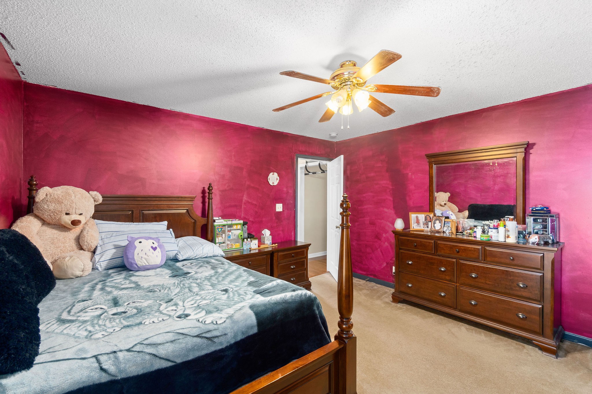 2492 Rafiki Drive Clarksville, TN 37042 - Photo 14 of 24 a bedroom with a bed and a mirror