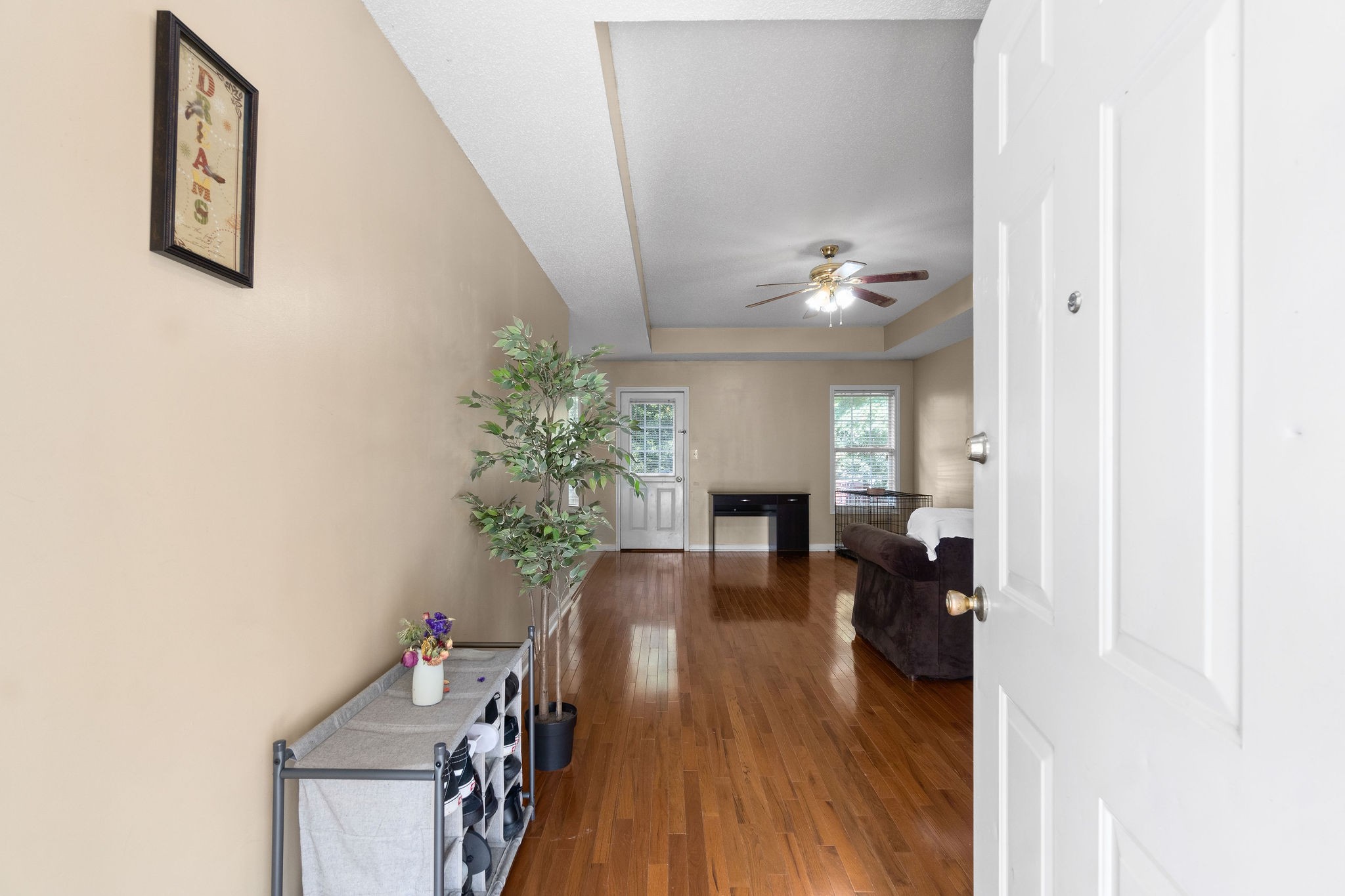 2492 Rafiki Drive Clarksville, TN 37042 - Photo 3 of 24 a view of a hallway with wooden floor fireplace and dining room
