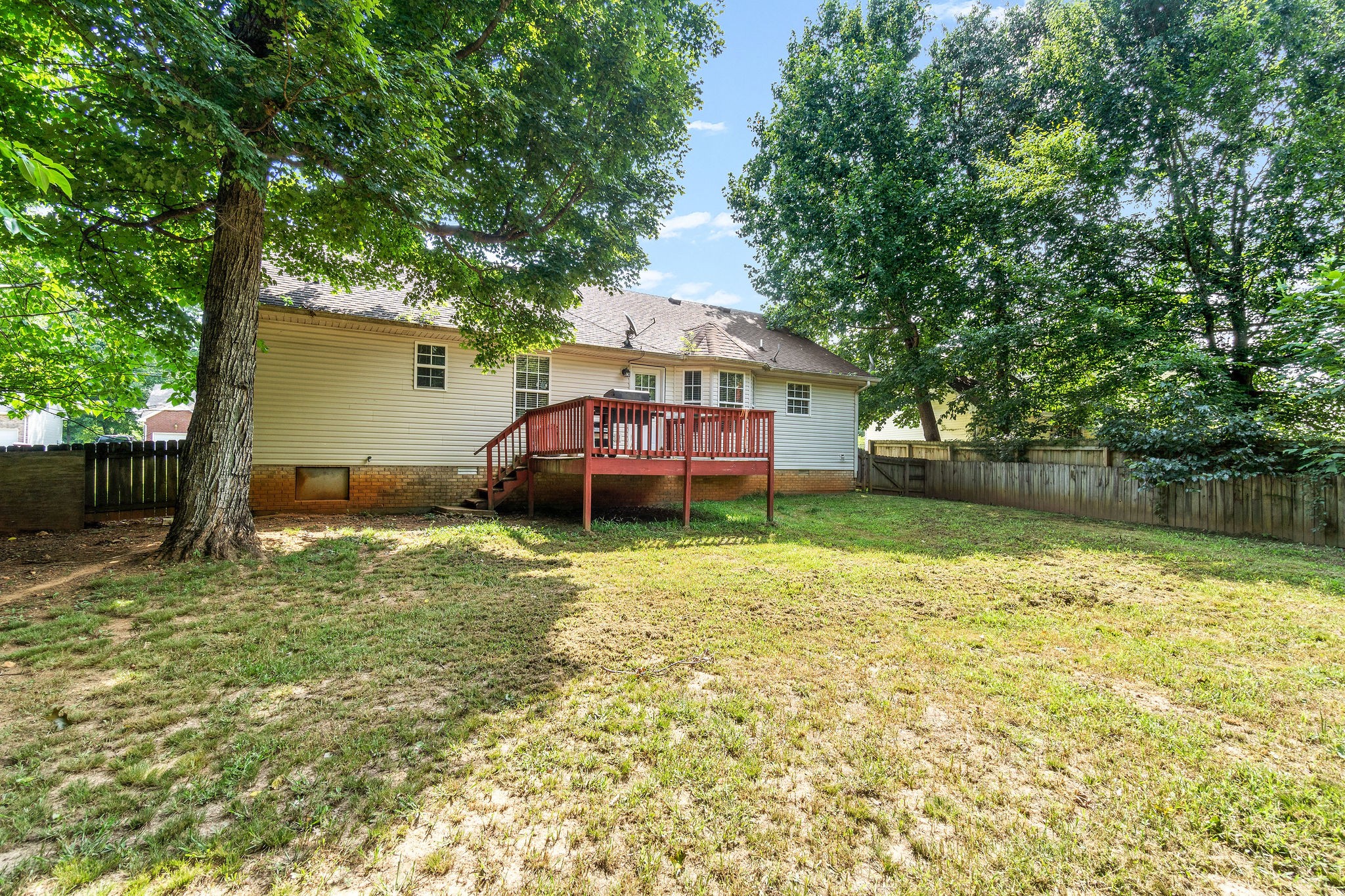 2492 Rafiki Drive Clarksville, TN 37042 - Photo 21 of 24 a backyard of a house with lots of green space