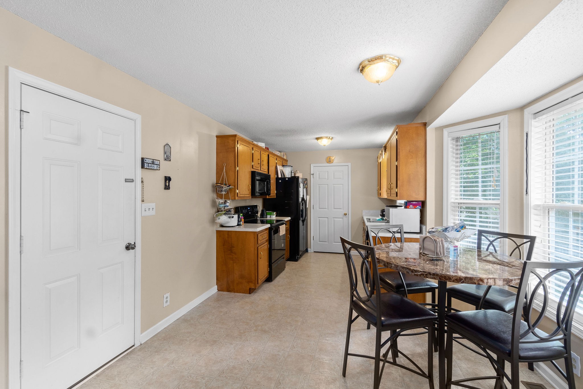 2492 Rafiki Drive Clarksville, TN 37042 - Photo 7 of 24 a dining room with furniture and window