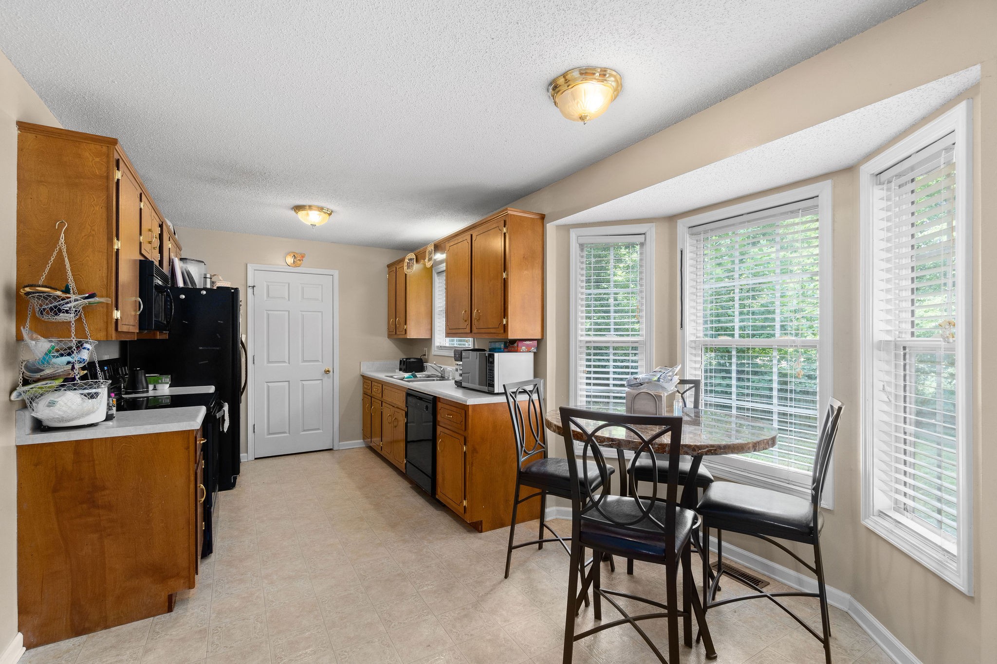 2492 Rafiki Drive Clarksville, TN 37042 - Photo 8 of 24 a view of a dining room with furniture window and outside view