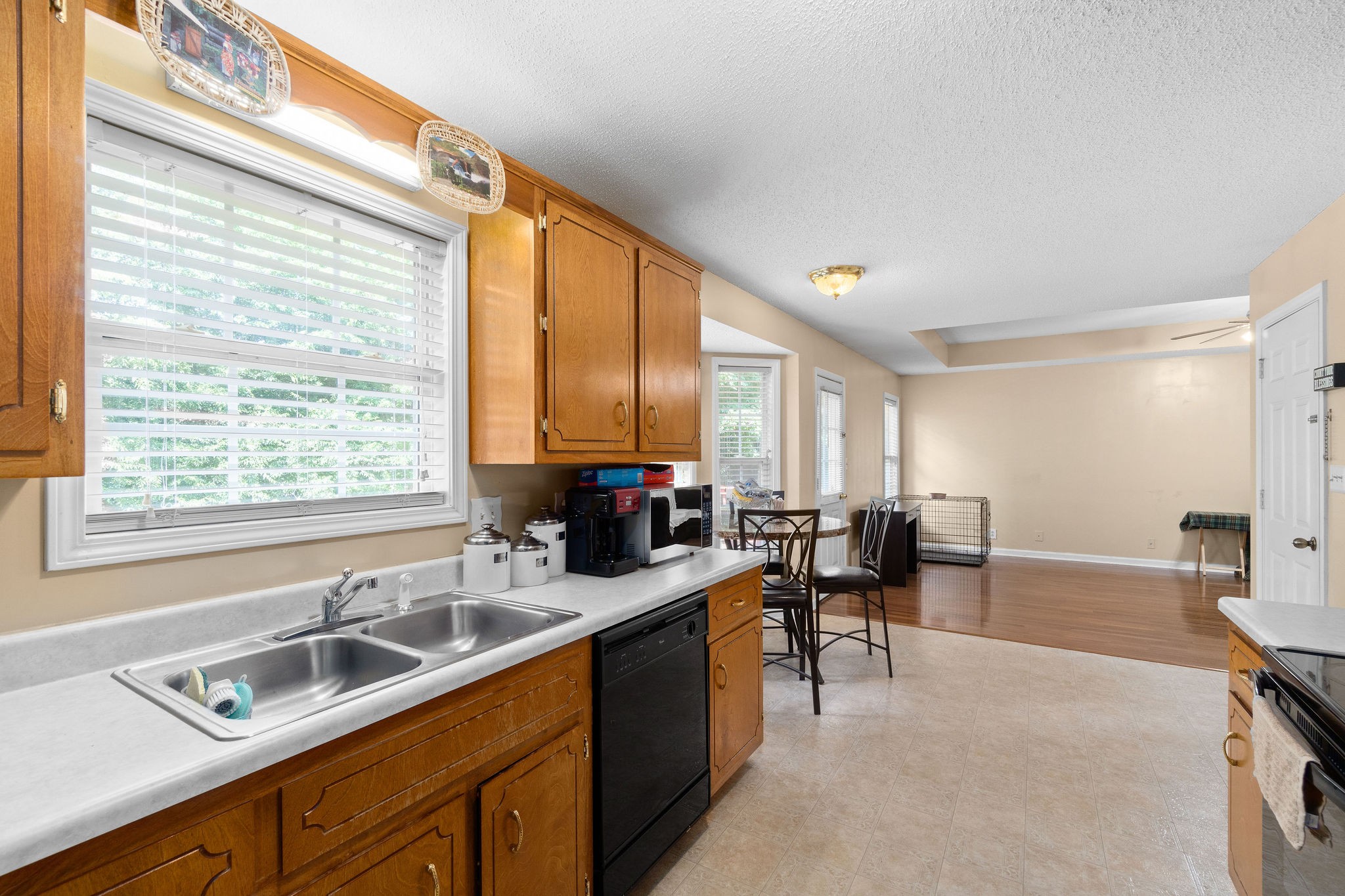 2492 Rafiki Drive Clarksville, TN 37042 - Photo 10 of 24 a kitchen with sink a counter top space and living room area