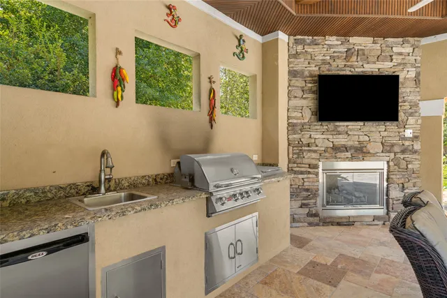 a kitchen with a stove and a microwave oven