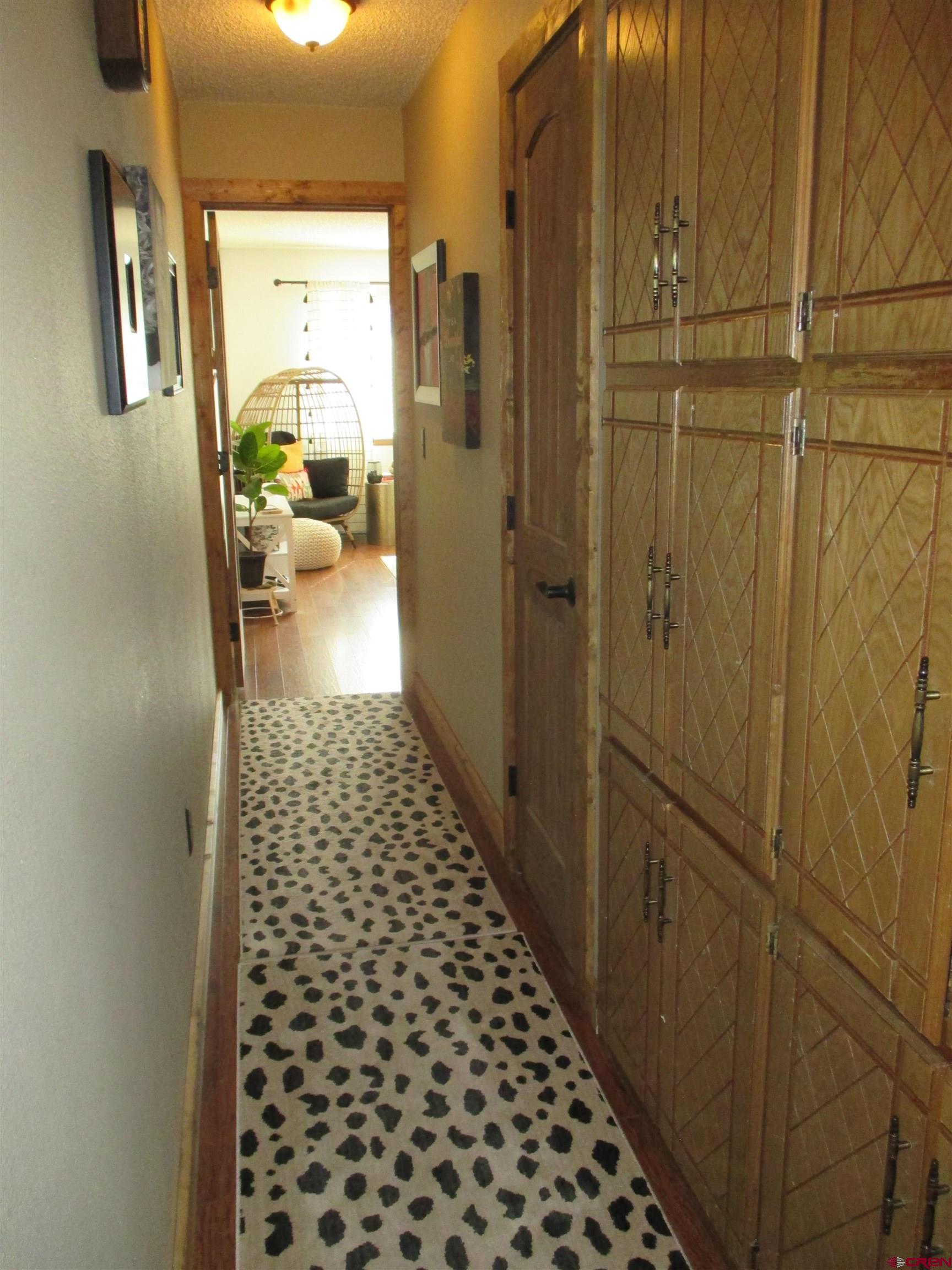 2364 Elk Road Lake City, CO 81235 - Photo 27 of 44 Hallway on south side of home to primary bedroom suite.