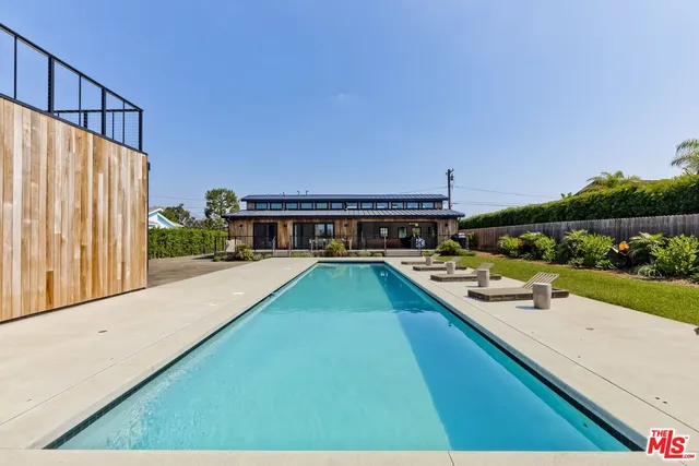 a view of swimming pool from a balcony