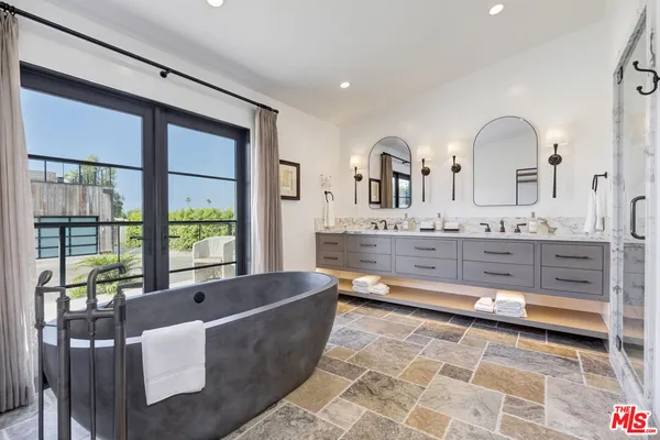 a living room with granite countertop furniture and fireplace