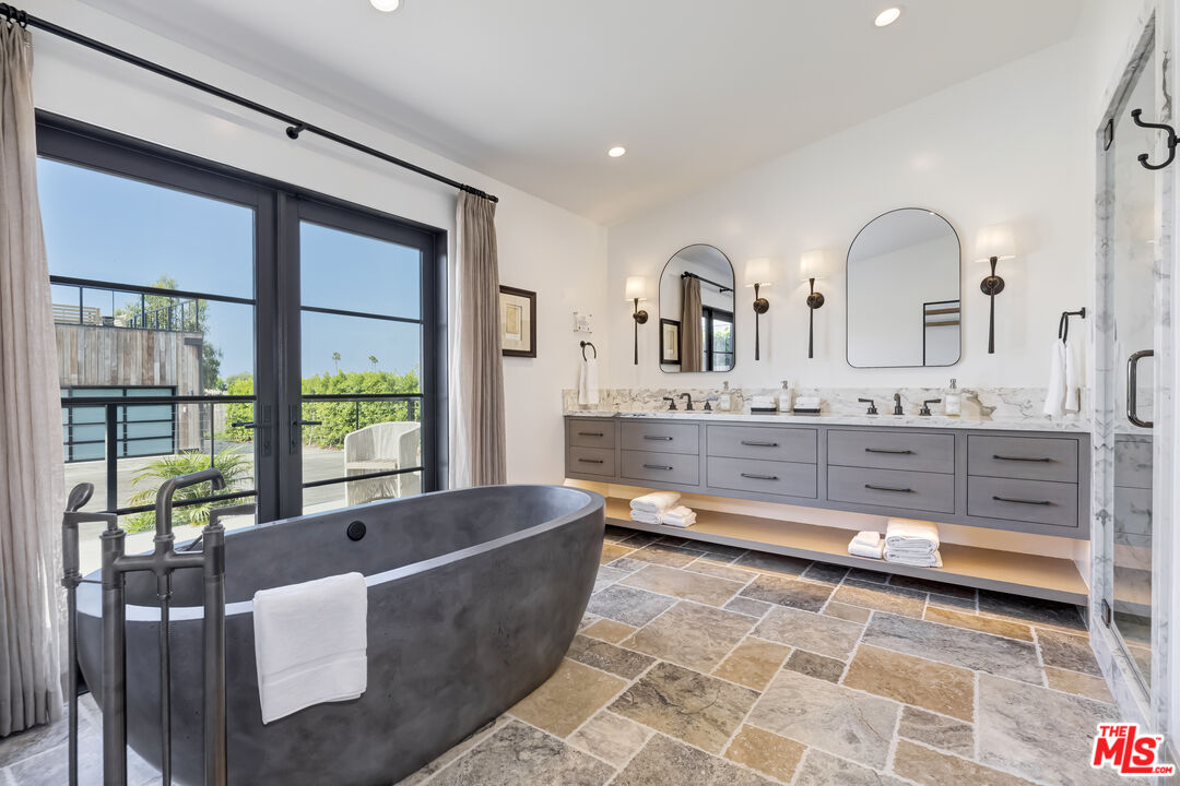 6711 Wandermere Road Malibu, CA 90265 - Photo 15 of 27 a living room with granite countertop furniture and fireplace