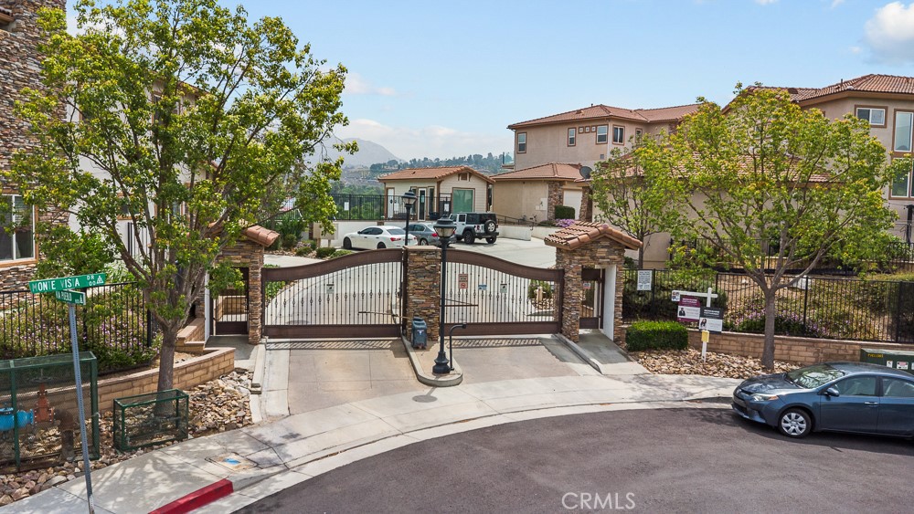 568 Vía Pueblo Riverside, CA 92507 - Photo 41 of 46 Security gate entrance