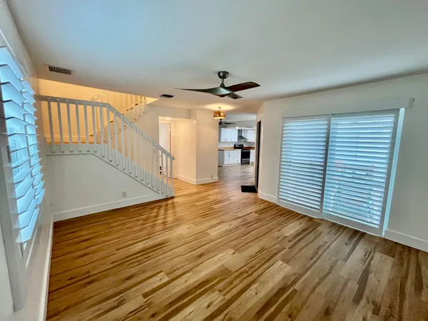 a view of a livingroom with a staircase