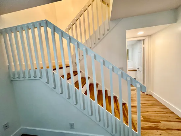 a view of entryway with wooden floor