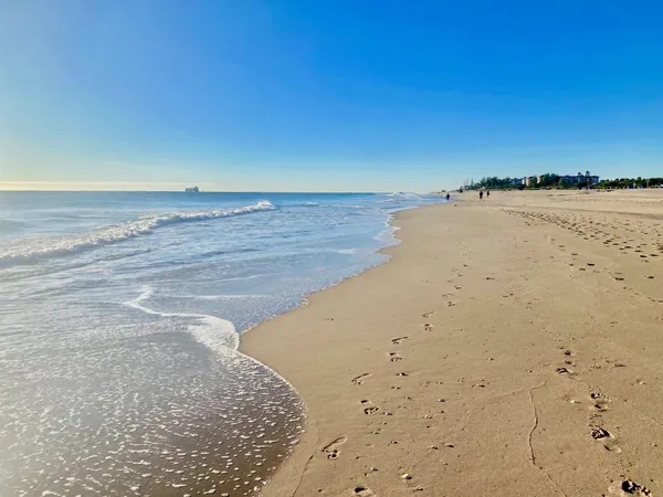 a view of beach and ocean