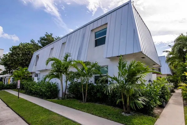 a house view with a garden space