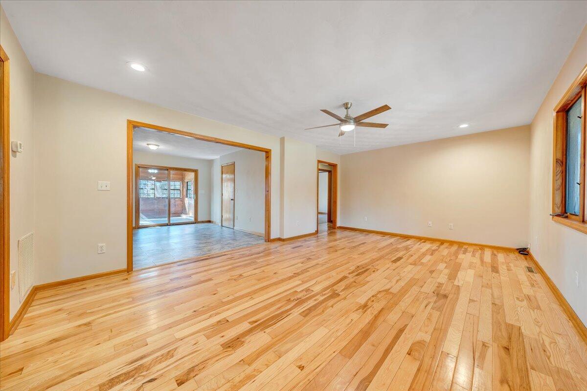 1296 3 Oaks Road Wirtz, VA 24184 - Photo 11 of 59 a view of an empty room and wooden floor