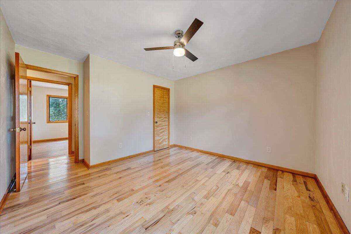 1296 3 Oaks Road Wirtz, VA 24184 - Photo 28 of 59 a view of empty room with wooden floor
