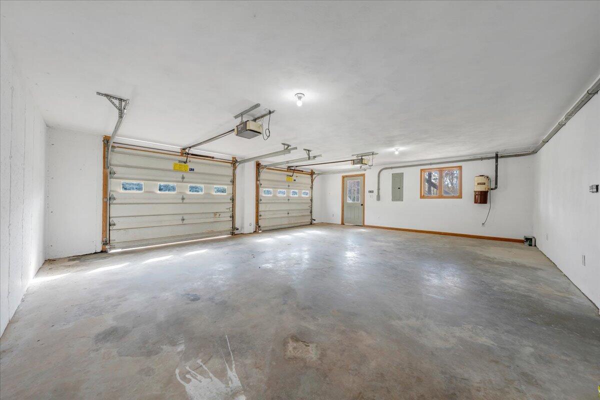 1296 3 Oaks Road Wirtz, VA 24184 - Photo 38 of 59 a view of a livingroom with furniture and a ceiling fan