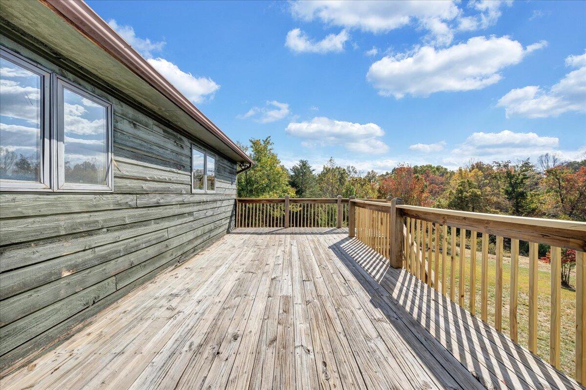 1296 3 Oaks Road Wirtz, VA 24184 - Photo 39 of 59 a view of deck with wooden floor and fence