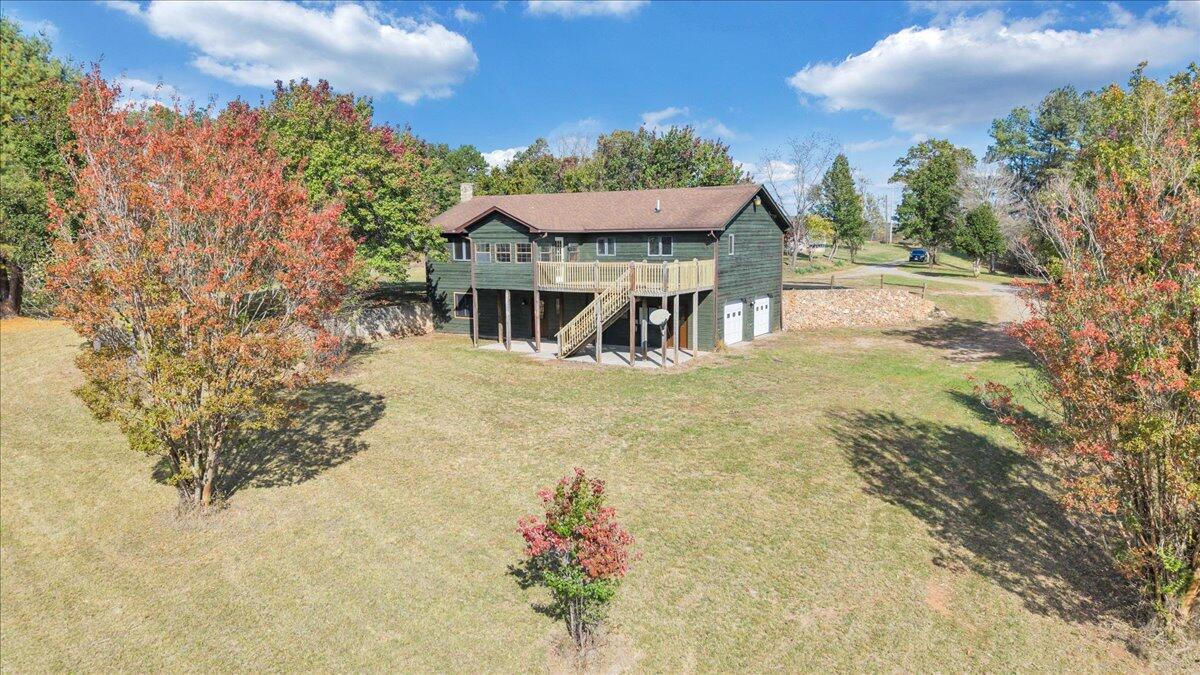 1296 3 Oaks Road Wirtz, VA 24184 - Photo 45 of 59 a view of a house with a yard