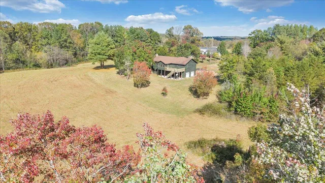 a view of a lake with mountains and valleys