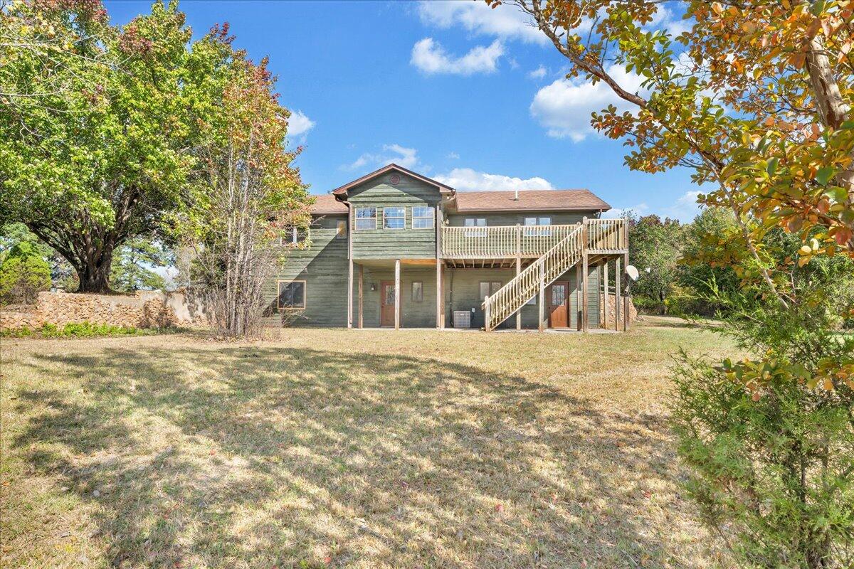 1296 3 Oaks Road Wirtz, VA 24184 - Photo 50 of 59 a front view of a house with a yard