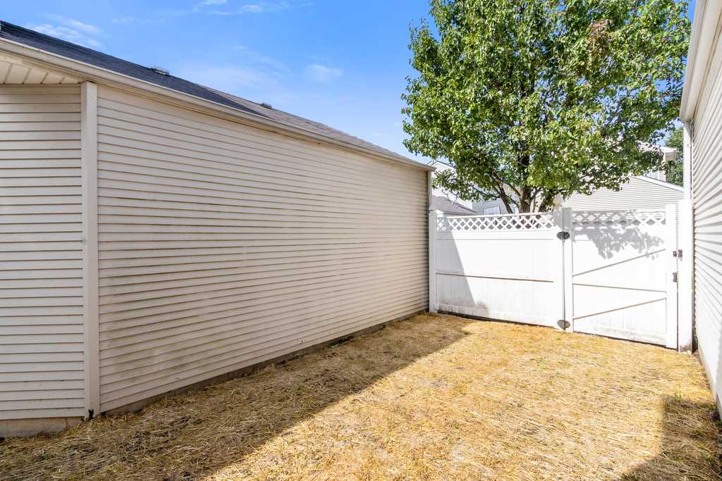191 Mountain Laurel Court Romeoville, IL 60446 - Photo 19 of 25 a view of a backyard