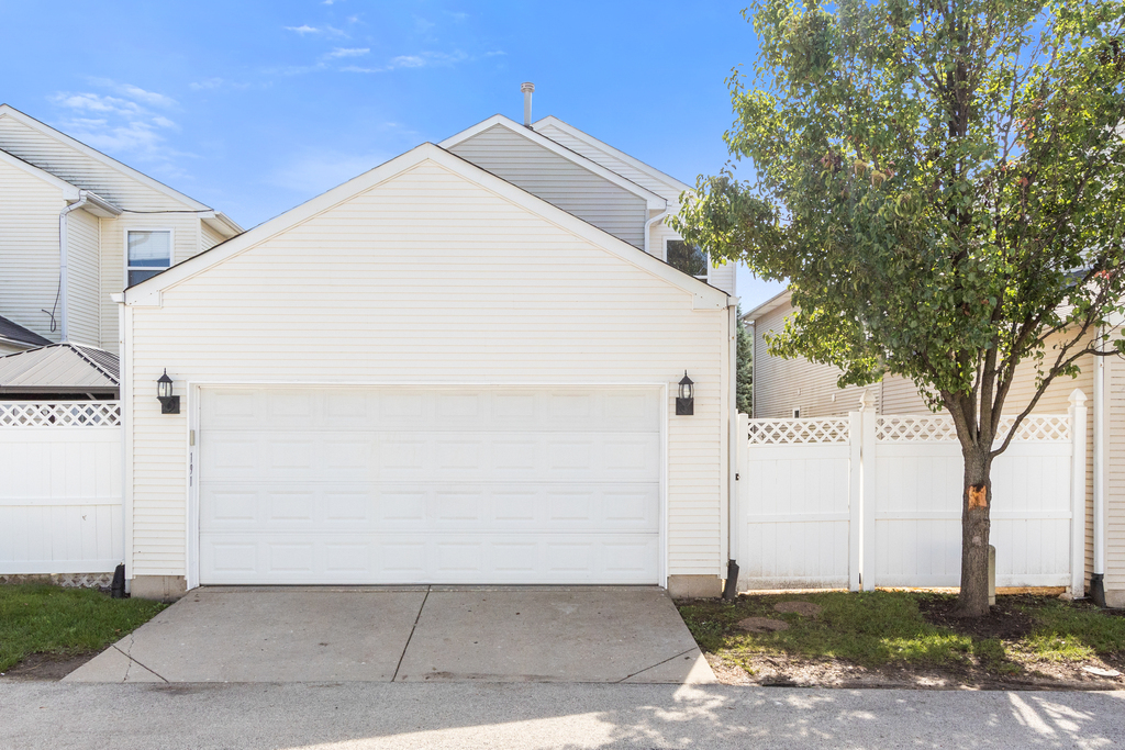 191 Mountain Laurel Court Romeoville, IL 60446 - Photo 20 of 25 a view of a house with a yard