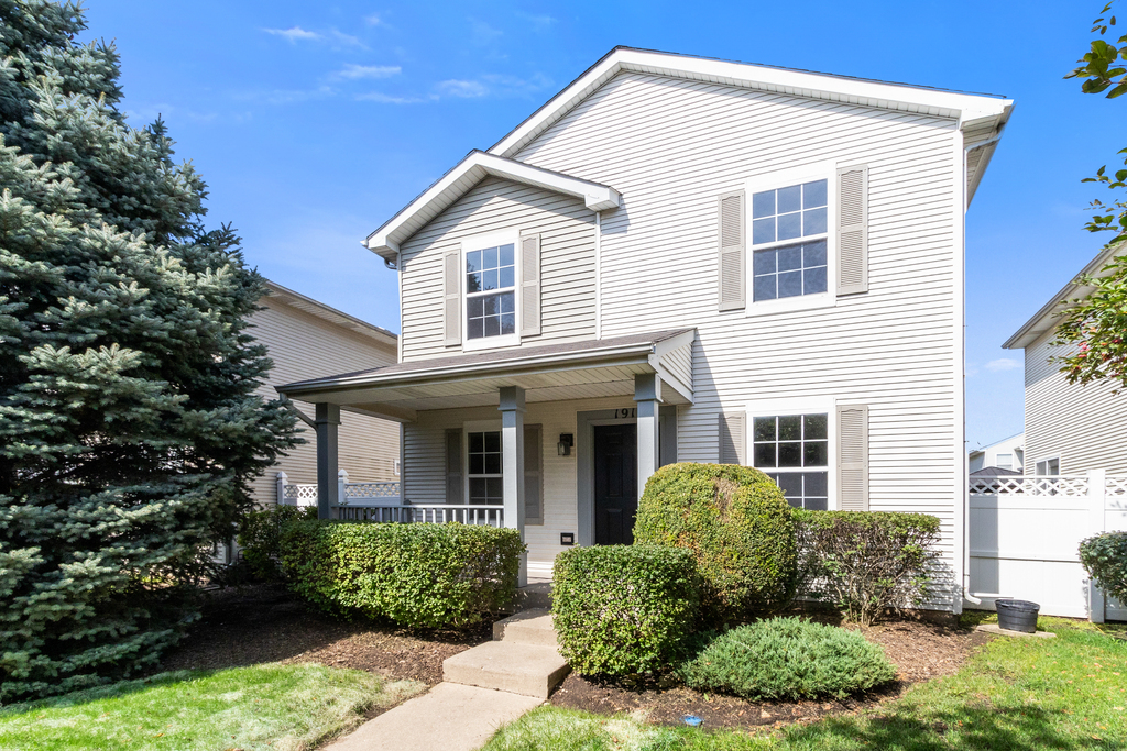 191 Mountain Laurel Court Romeoville, IL 60446 - Photo 2 of 25 a view of a white house next to a yard