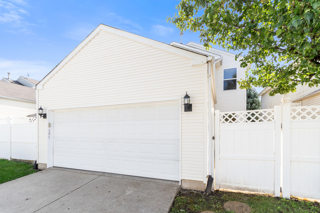 191 Mountain Laurel Court Romeoville, IL 60446 - Photo 21 of 25 a view of a house with a backyard