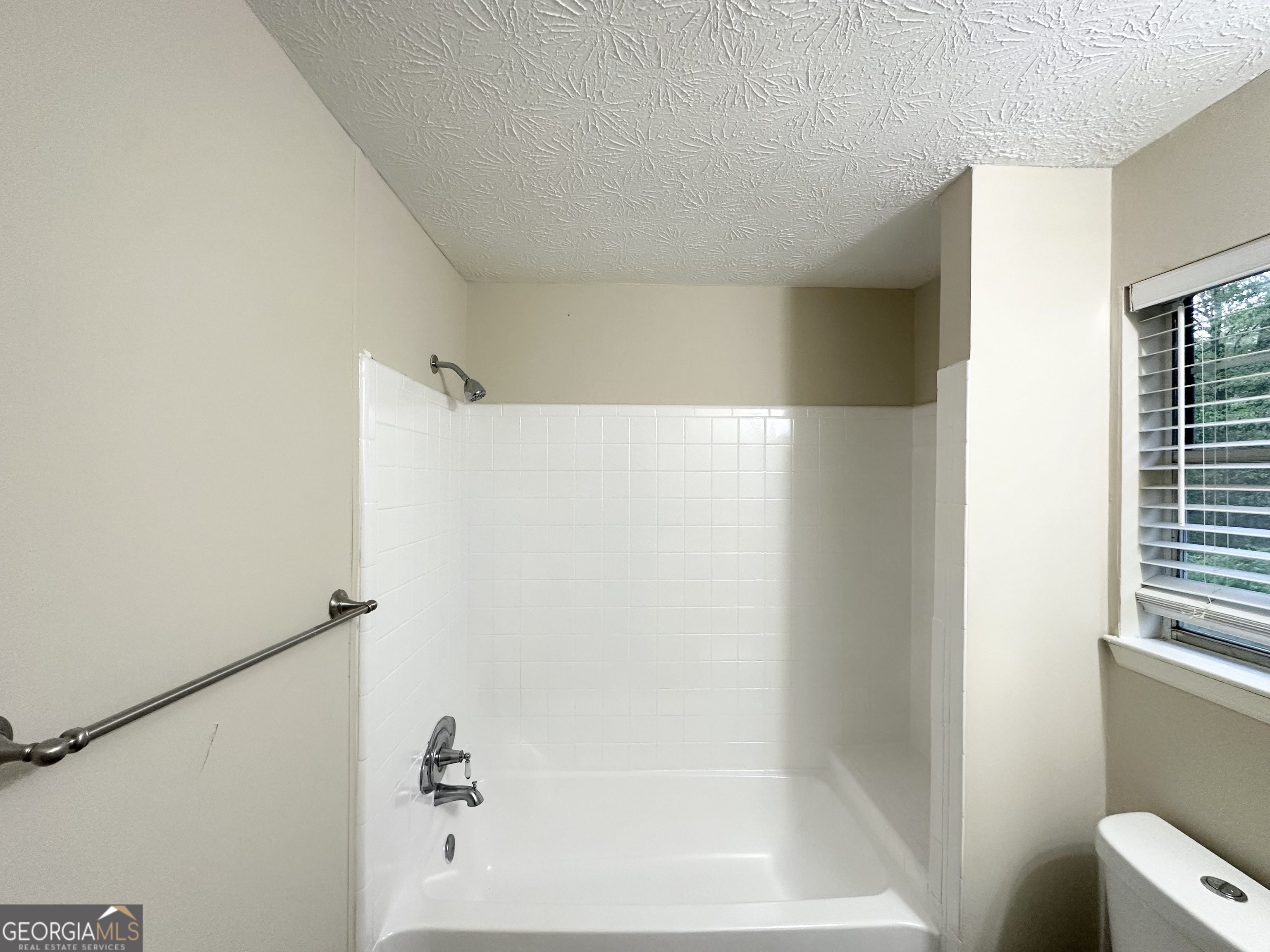 3865 Lehigh Boulevard Decatur, GA 30034 - Photo 18 of 19 a bathroom with a bathtub