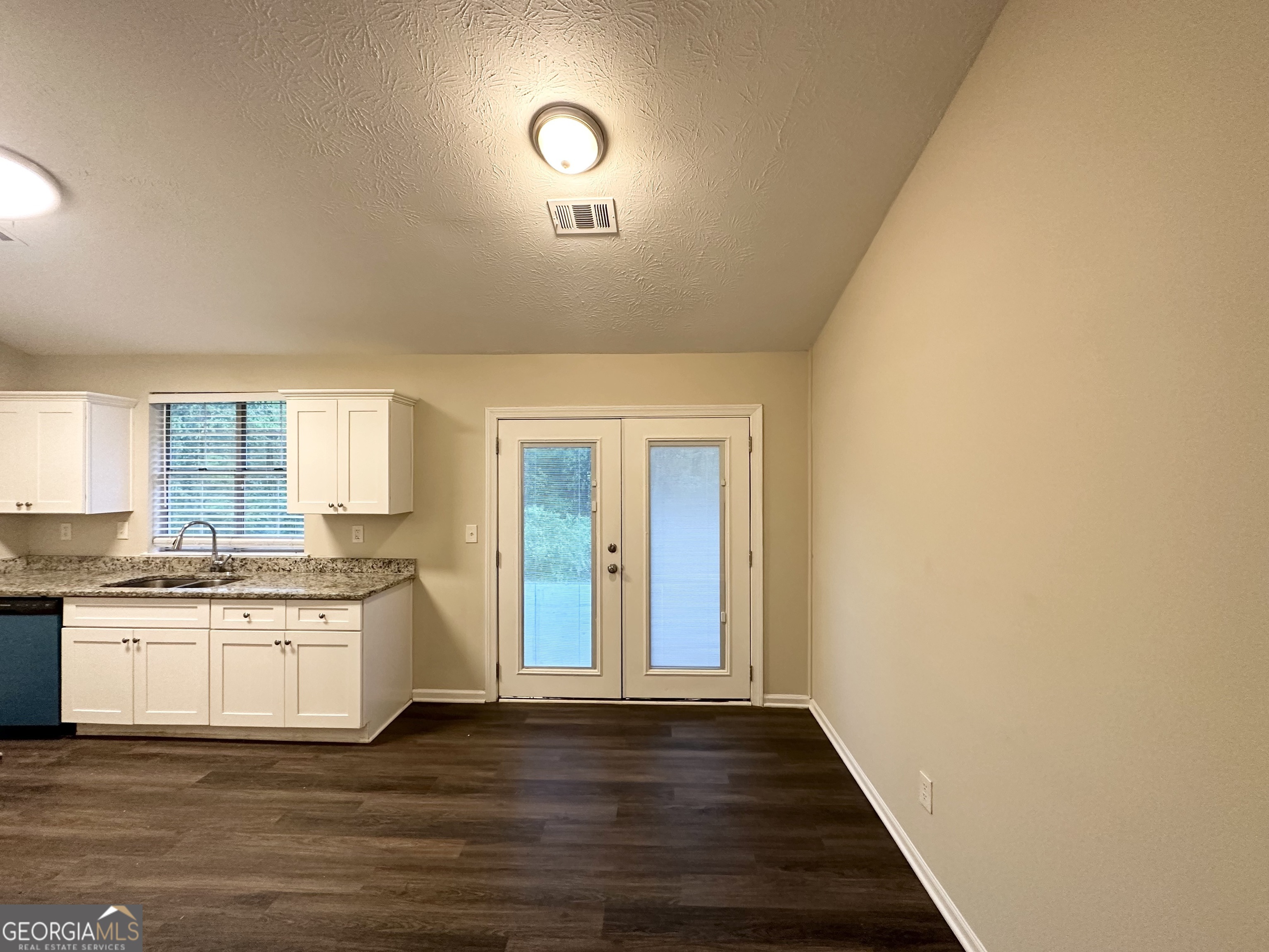3865 Lehigh Boulevard Decatur, GA 30034 - Photo 5 of 19 a view of a kitchen with a sink and a stove top oven