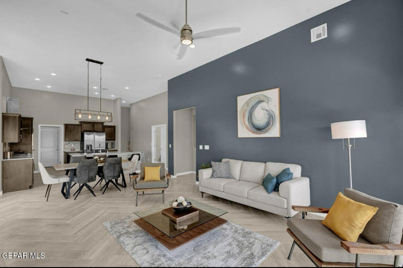 12434 Fill Ball Street El Paso, TX 79928 - Photo 15 of 32 a living room with furniture and view of kitchen