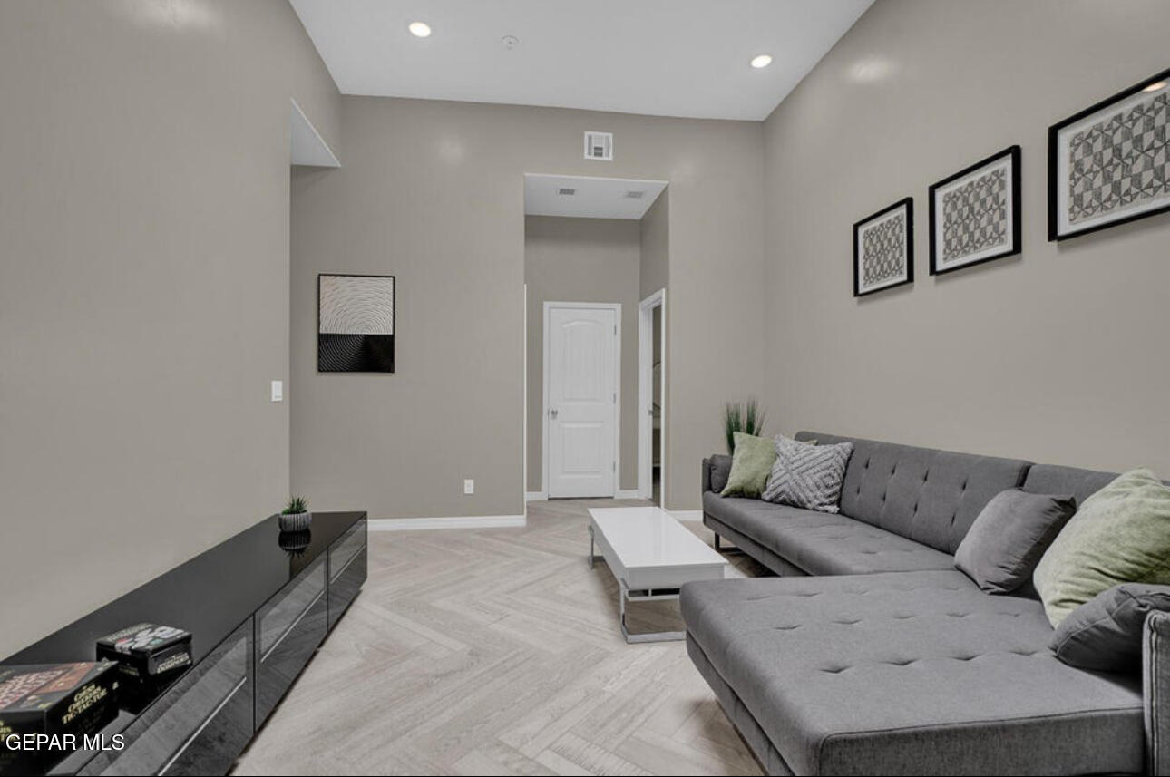 12434 Fill Ball Street El Paso, TX 79928 - Photo 22 of 32 a living room with furniture and wooden floor